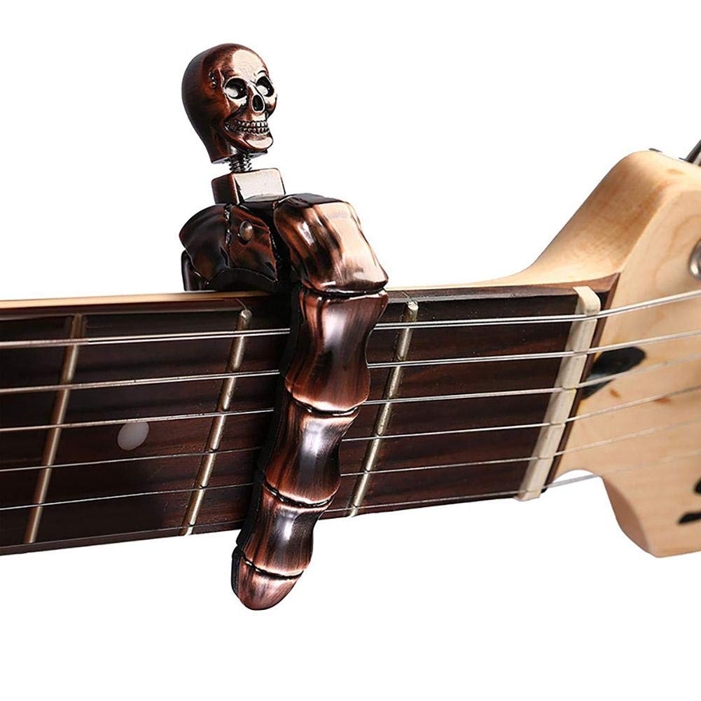 Capo Gitar Bentuk Tengkorak un - Musical Instruments Easy ulasan dan harga